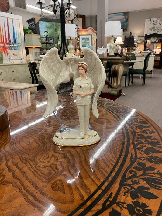 Figural Porcelain Angel of Compassion